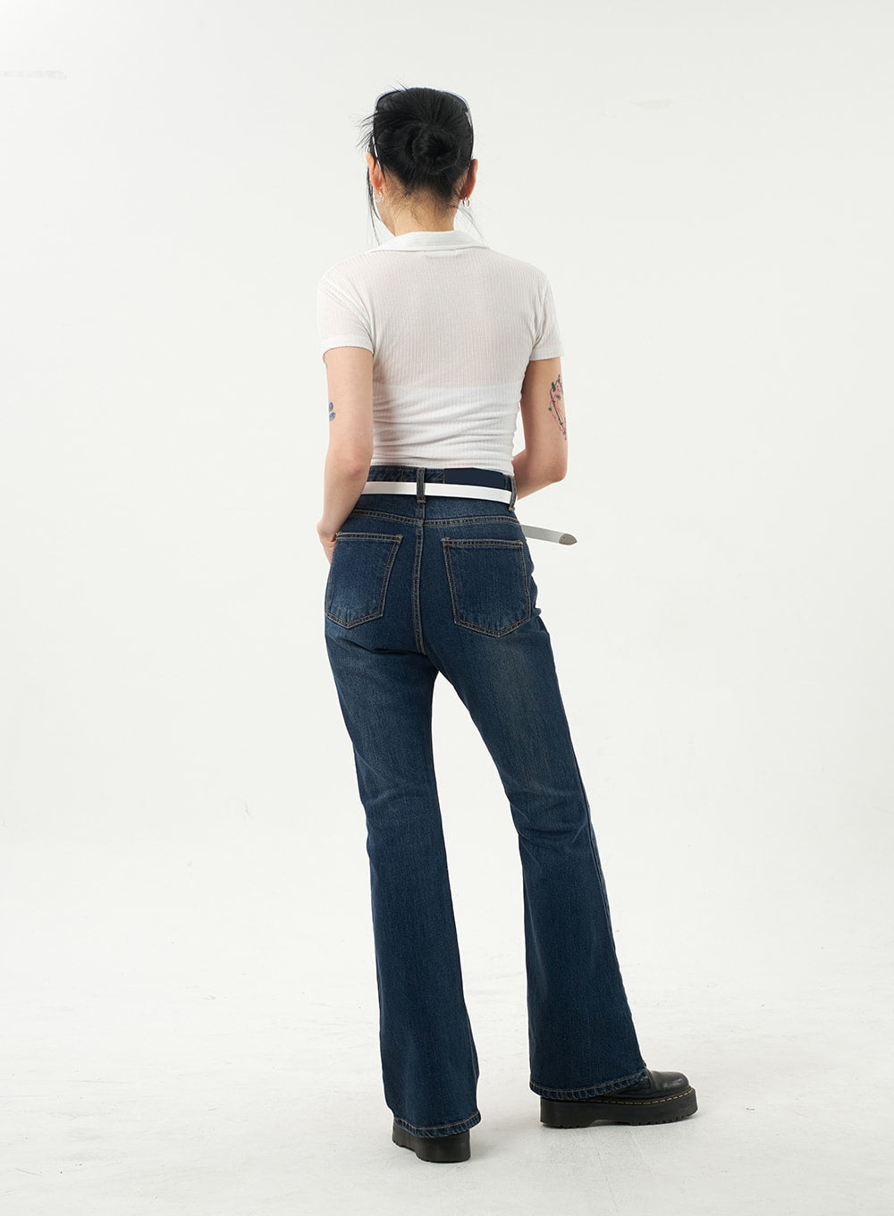 Dark Wash Bootcut Jeans CA328 in dark blue, full back view on model, two rear pockets with stitching detail, slim fit through seat, bootcut flare from knee to hem.