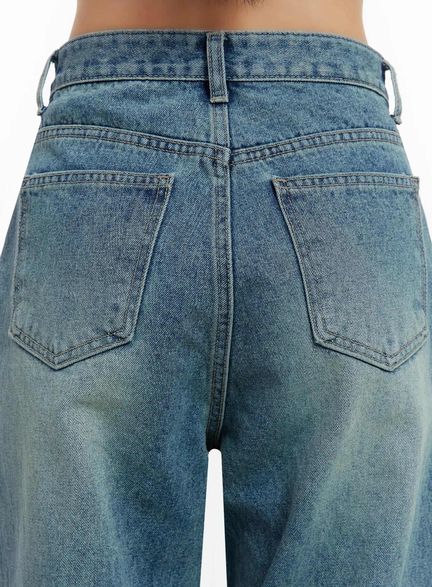 Pixi Straight Leg Jeans ID525 in blue, macro close-up of back waistband and back pockets on model, showing detailed topstitching, washed denim texture, and belt loop construction.