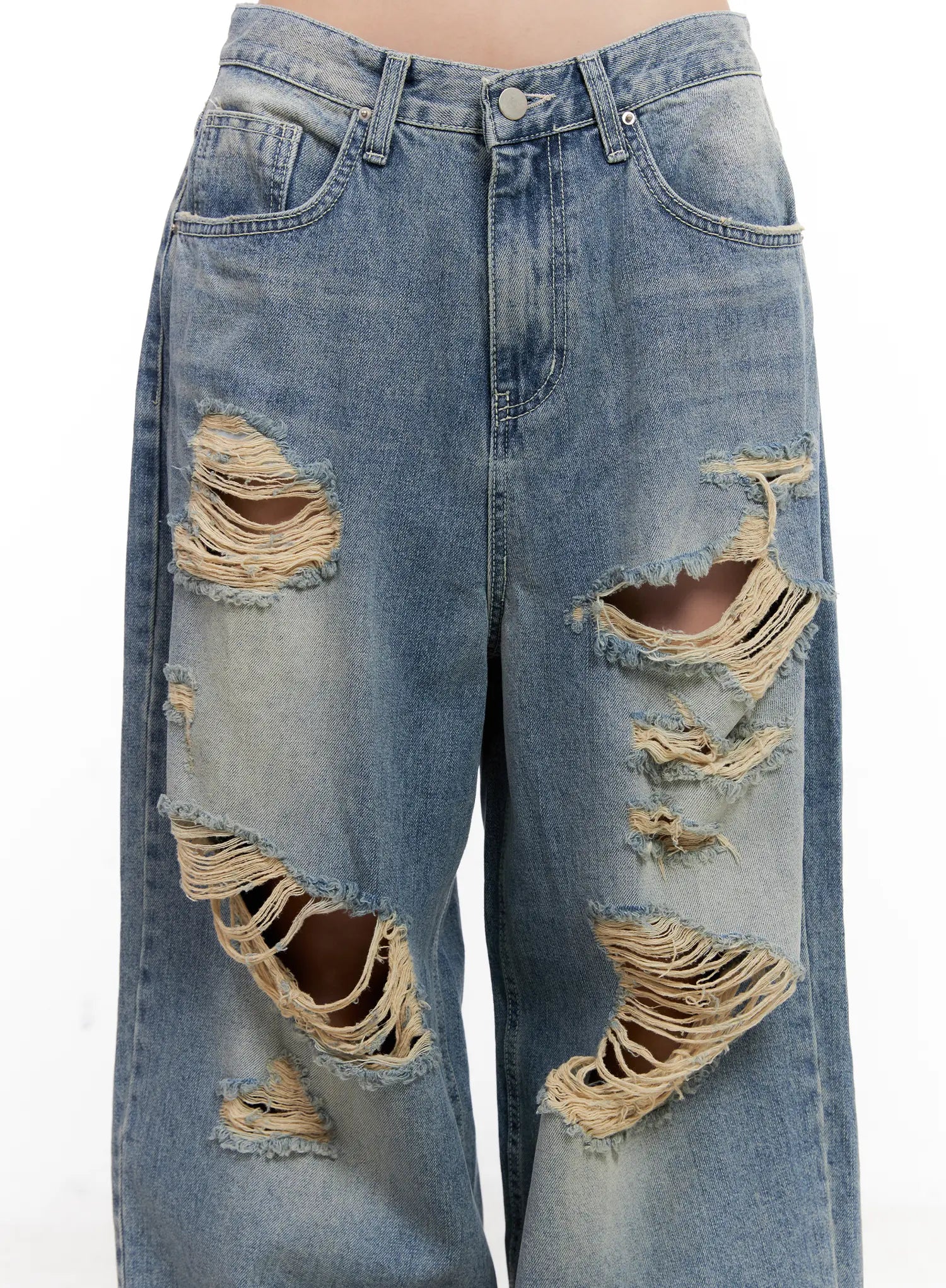 Manon Washed Distressed Wide Jeans CL518 in blue, close-up detail shot of waistband to knee area, showcasing large frayed destroyed holes, washed fading, and five-pocket cotton denim construction.