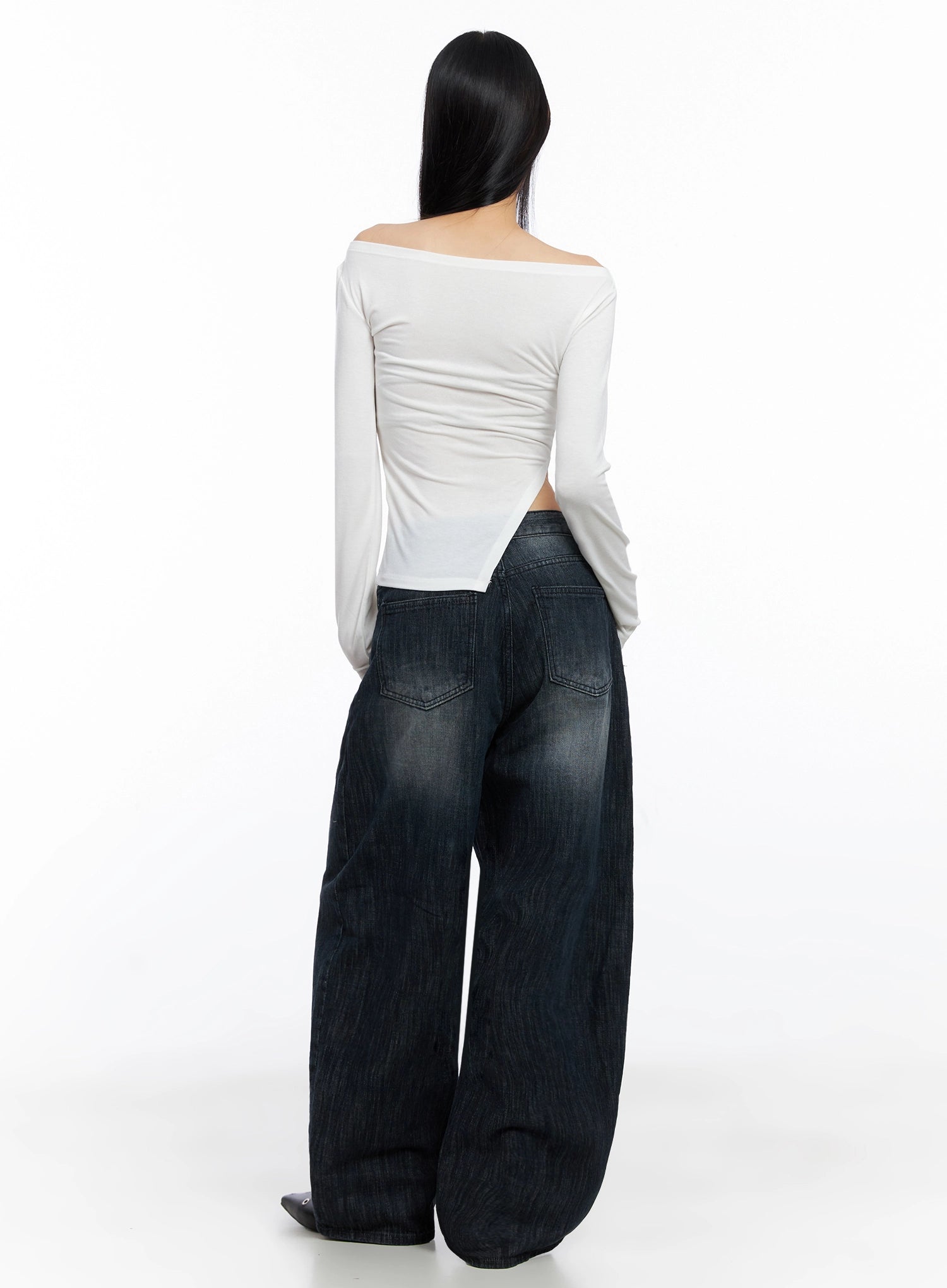 Minnell Vintage-Wash Wide-Leg Jeans IO517 in dark blue, back view on model in white off-shoulder top, showing back patch pockets, vintage-wash fading, and voluminous wide leg hem.