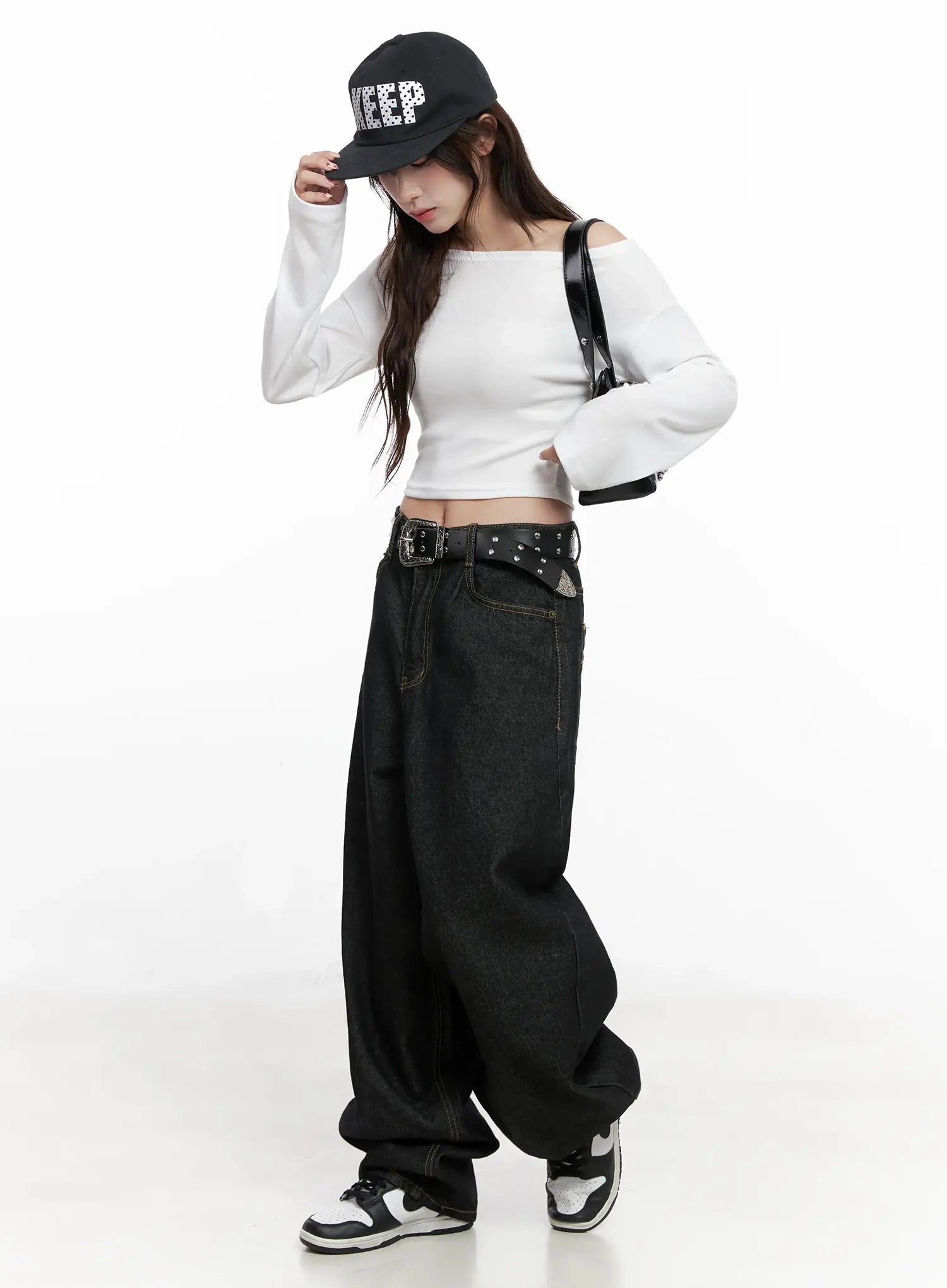 Halo Wide Leg Stitch Detail Jeans IN514 in black, full-body front on model with street-style accessories, wide cotton denim with gold topstitch, styled with studded belt, cap, and crossbody bag.