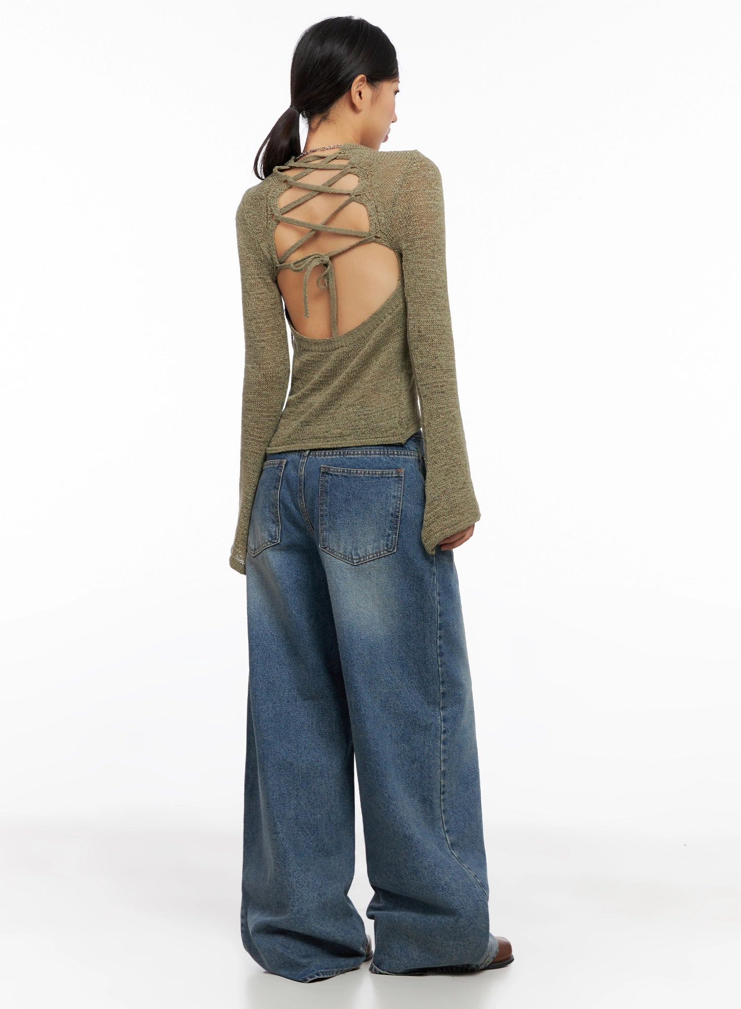 Lilah Wide-Leg Washed Jeans IG527 in mid-blue, back full-body on model, wide-leg washed denim with back pockets, paired with olive lace-up open-back knit top.