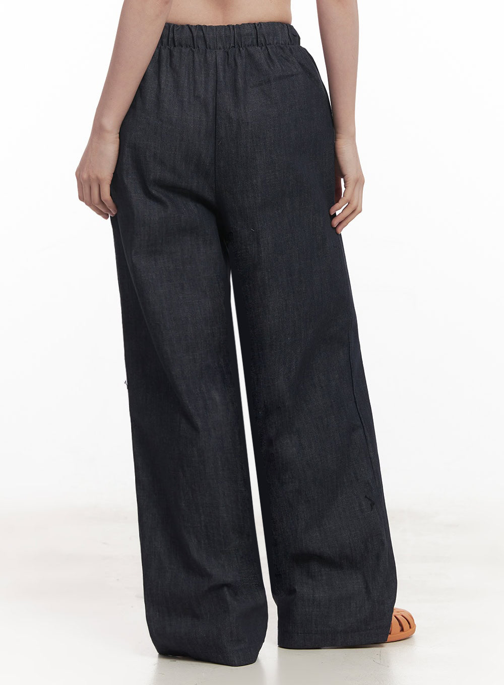 Cotton Denim Wide-Leg Pants IY509 in dark navy, back waist-to-hem shot on model, displaying elastic banded back waist and wide straight-leg cotton denim fall without back pockets.