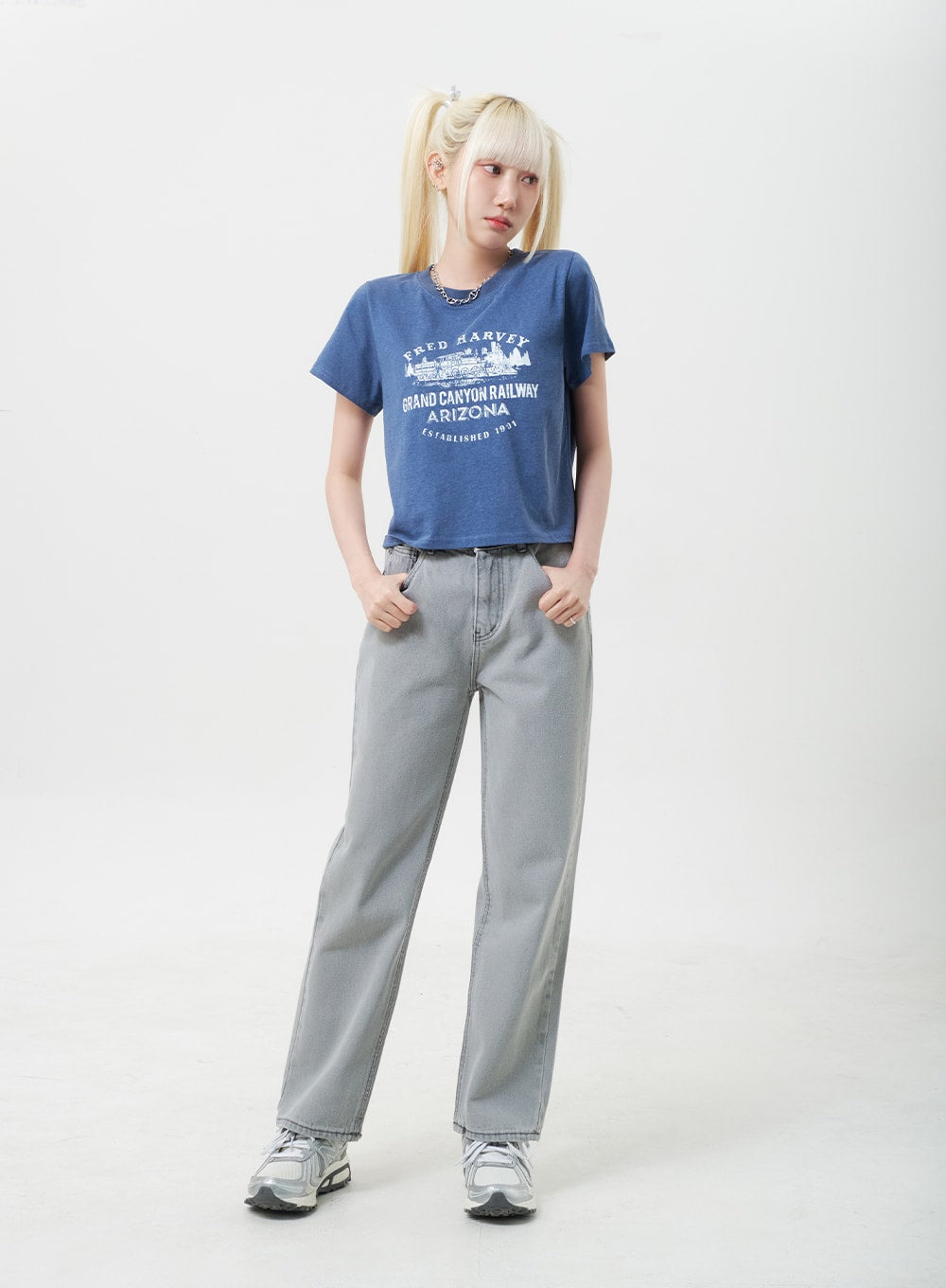 LEWKIN Straight Leg Jeans BU302 in gray, front full-body on model, wide-fit cotton denim with banded waist, styled with blue graphic tee and silver sneakers.