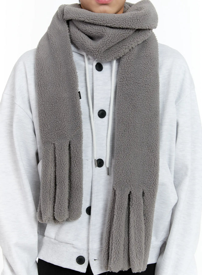 LEWKIN Soft Plush Winter Scarf ID502 in Gray, front close-up on model, fluffy sherpa fleece texture, finger-slit ends, draped over white button-up sweatshirt.