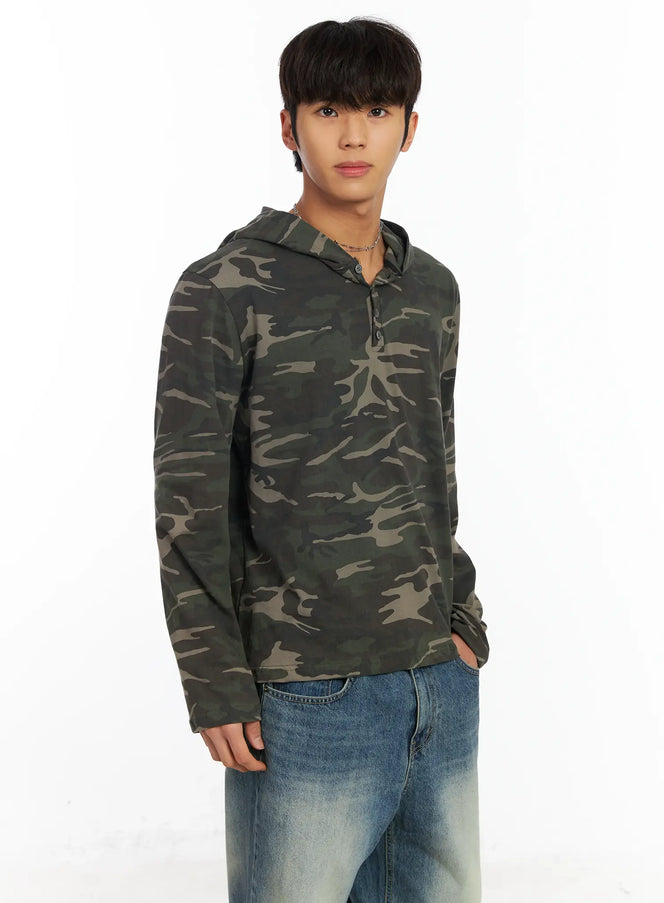 LEWKIN Men's Camo Henley Hoodie IF504 in green camo, angled front view on model, long sleeve lightweight hoodie with henley button placket, paired with blue jeans.