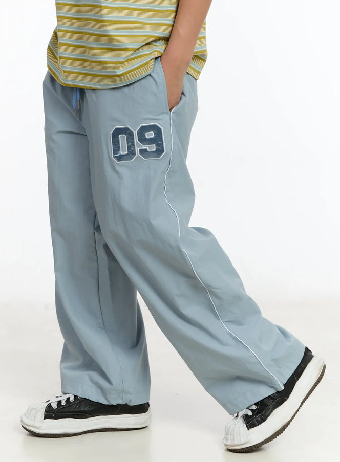 mens-09-graphic-nylon-drawstring-pants-im503