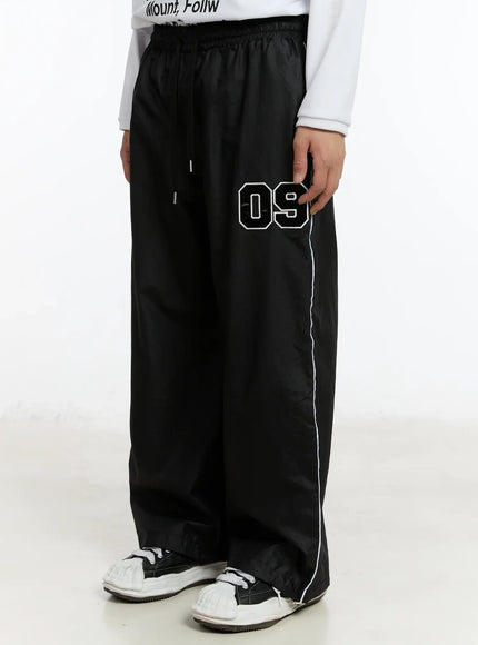 mens-09-graphic-nylon-drawstring-pants-im503