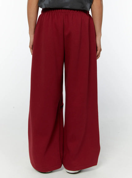 mens-graphic-parachute-string-sweatpants-red-iy513
