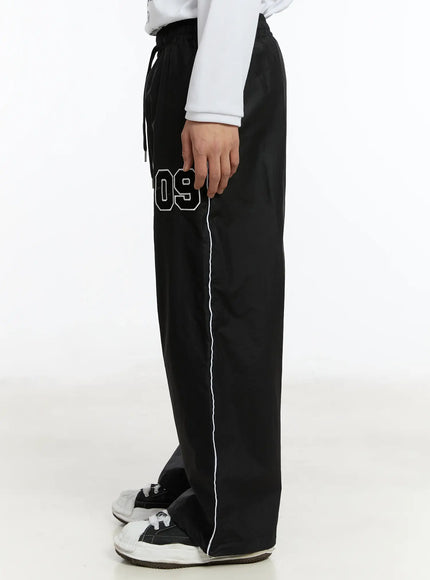 mens-09-graphic-nylon-drawstring-pants-im503