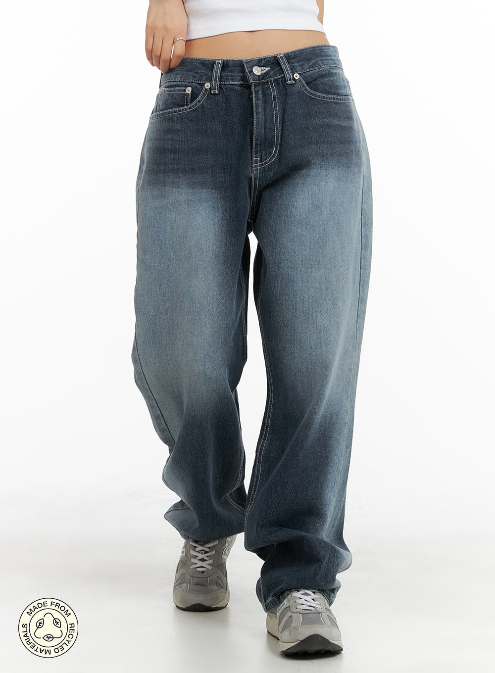 LEWKIN Recycled Wide Baggy Jeans (Unisex) CM425 in dark blue, front cropped view on model, washed cotton denim wide-leg silhouette with white contrast stitching, paired with grey sneakers.