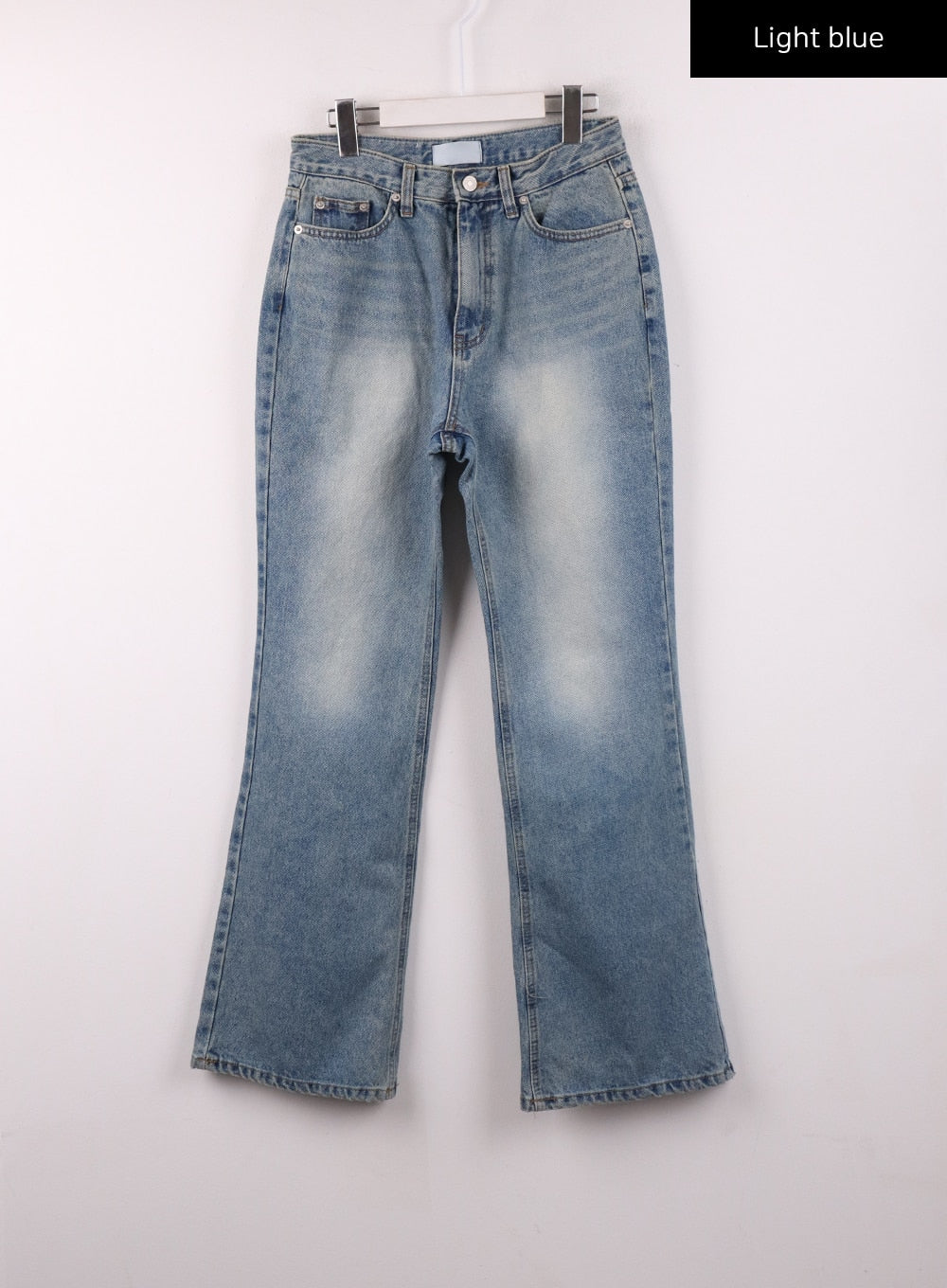 Washed Straight Leg Bootcuts Jeans IJ430 in light blue, flat front product shot on hanger, full-length bootcut silhouette, washed fading, five-pocket design, silver button closure.