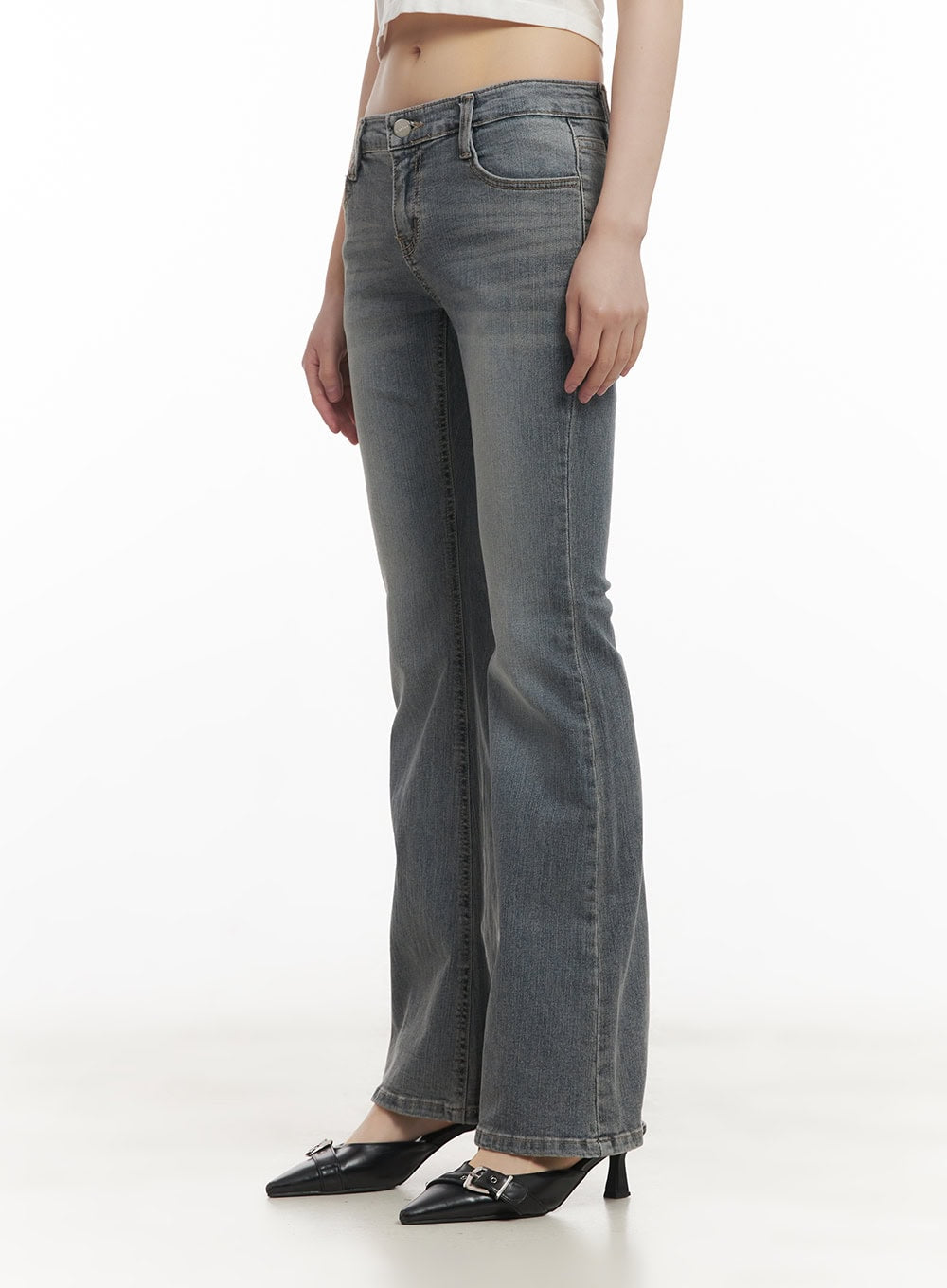 Rachel Washed Bootcut Jeans with Hip Pads CF518 in gray, side close-up on model from hip to hem, highlighting low-waist fit, slim thigh, and gentle bootcut flare in washed cotton denim.