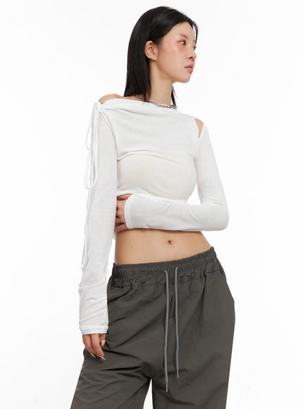 assymetric-cut-out-long-sleeve-top