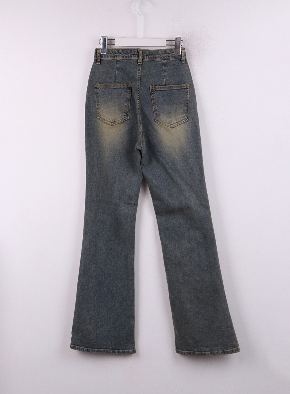 Washed Slim Fit Bootcut Jeans CJ431 in blue, flat back hanger shot, showing dual back pockets, yellow-toned vintage wash fading, subtle bootcut hem flare, and clean stitching on cotton-denim-spandex fabric.