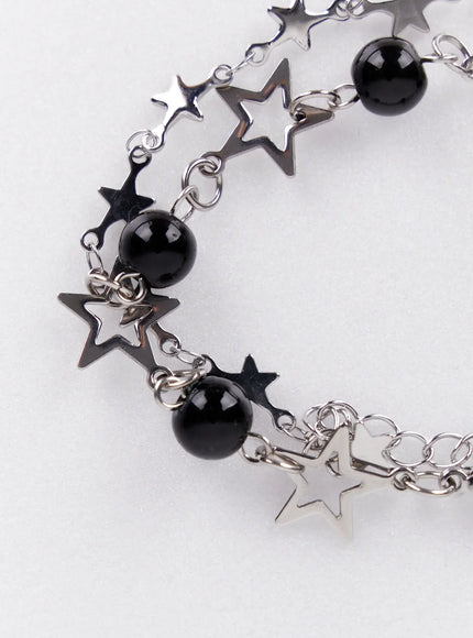 star-charm-bracelet-with-black-beads-iy520