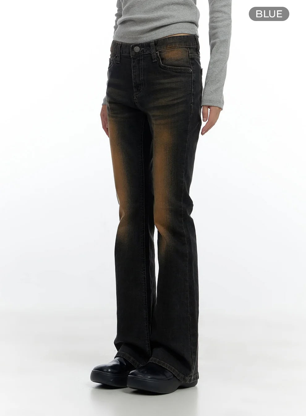 Harley Slim Washed Denim Bootcut Jeans CS420 in Blue, angled front-side view on model, slim fit with bold amber washed gradient, five-pocket styling, subtle bootcut flare at ankle.