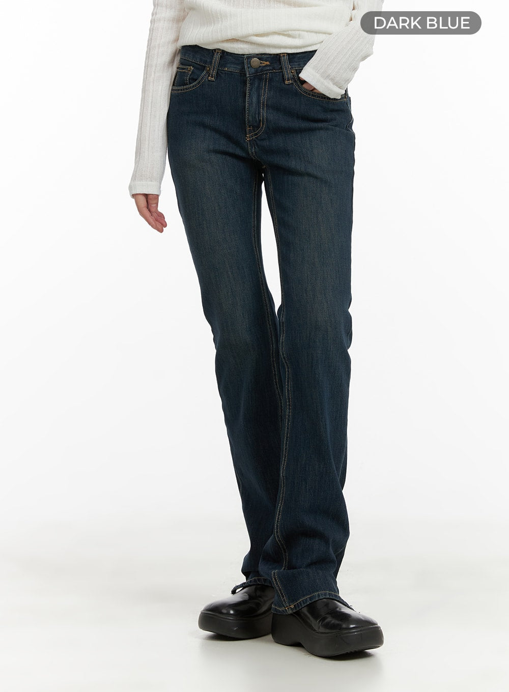 Slim Fit Bootcut Jeans CA418 in dark blue, front view color swatch shot on model, washed slim-fit denim with bootcut flare, paired with white ribbed knit top and black loafers.