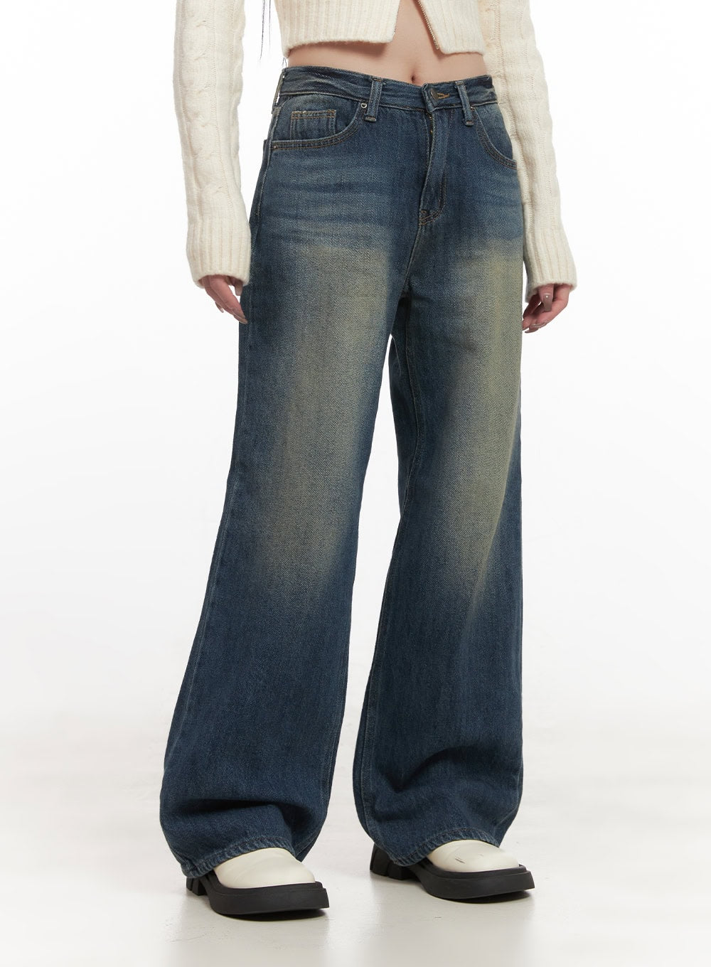Audrey Washed Wide-Leg Jeans CJ516 in dark blue, front three-quarter close-up on model, waistband and front pocket detail visible, washed denim with golden fading and wide-fit leg.
