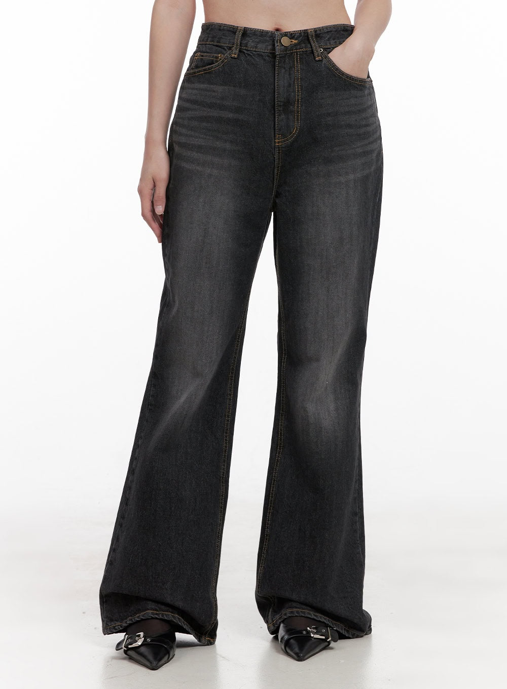 Kiana Cotton Wide Fit Flared Jeans OD403 in black, front close-up from waist to hem on model, high-rise washed denim with flared leg opening, gold contrast topstitching and five-pocket design.