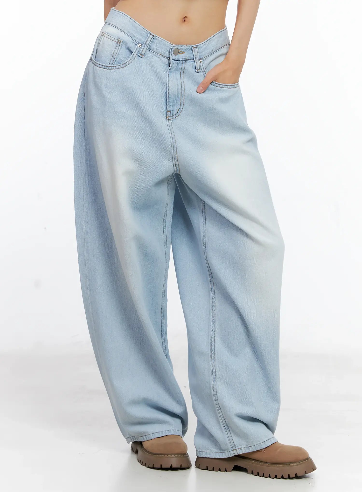 Bona Relaxed-Fit Denim Jeans CL529 in light blue, angled front close-up from waist to ankle on model, highlighting V-waistband, washed gradient, contrast topstitching, and wide barrel-leg silhouette.