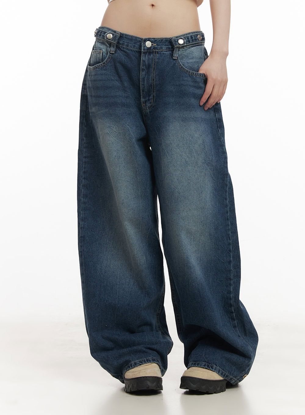 Bri Oversized Buttoned Baggy Jeans CF518 in dark blue, front three-quarter on model, hand in pocket, low-waist tab and silver buttons highlighted, washed wide-leg denim.