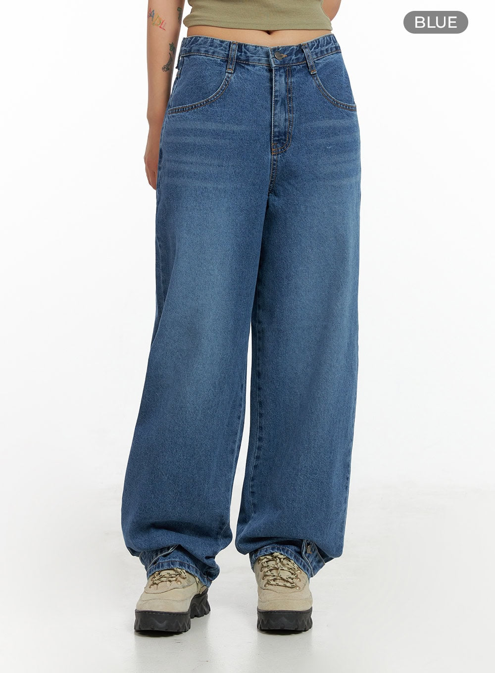 Wide Leg Baggy Jeans CL415 in blue, front color-swatch waist-down shot on model, washed denim, button fly, wide baggy fit with front pockets, hem stacked over chunky sneakers.