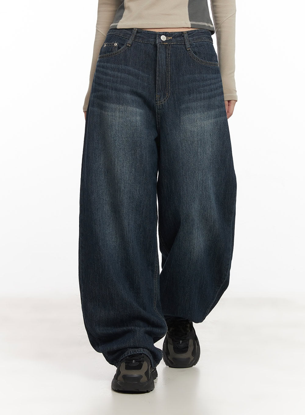 Renna Baggy Jeans CA521 in dark blue, front waist-to-hem close-up on model walking, washed denim with button fly, whisker fading, and dramatically wide pooling leg opening.
