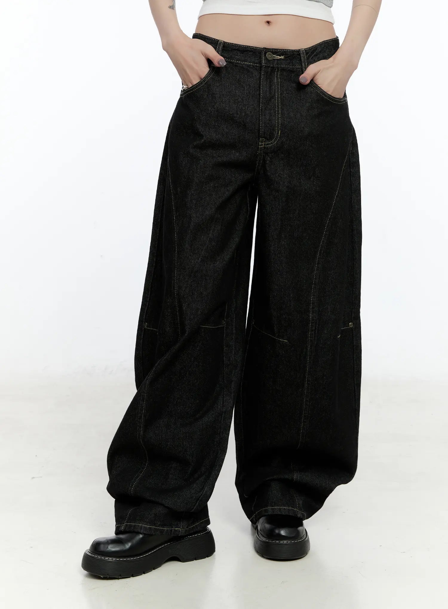 Maryam Low-Rise Dark-Washed Jeans CN517 in black, close-up front waist-to-hem shot, low-rise button closure, contrast topstitching on seam panels, ultra-wide leg cotton denim.
