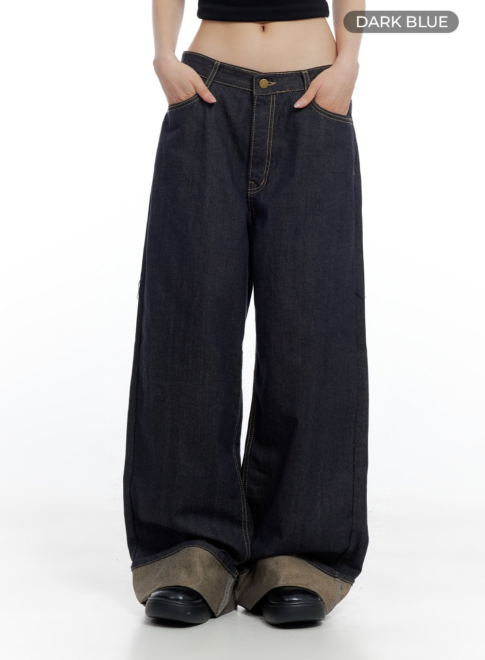 Sadie Roll-Up Denim Jeans CO426 in dark blue, front color-swatch shot on model, low-rise wide-fit baggy denim with brass button closure, contrast roll-up hem, and gold contrast stitching throughout.