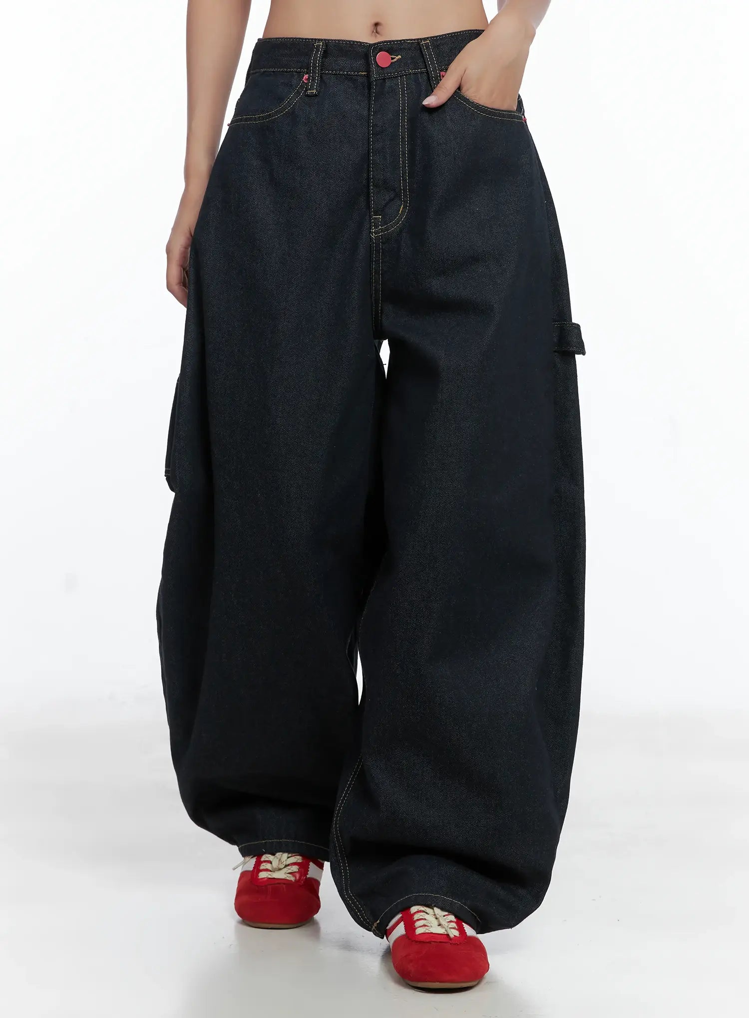 Heart Pocket Balloon Jeans CS503 in dark indigo, front three-quarter view on model, balloon wide-leg silhouette, red button, yellow contrast stitching, side cargo pocket, long length.