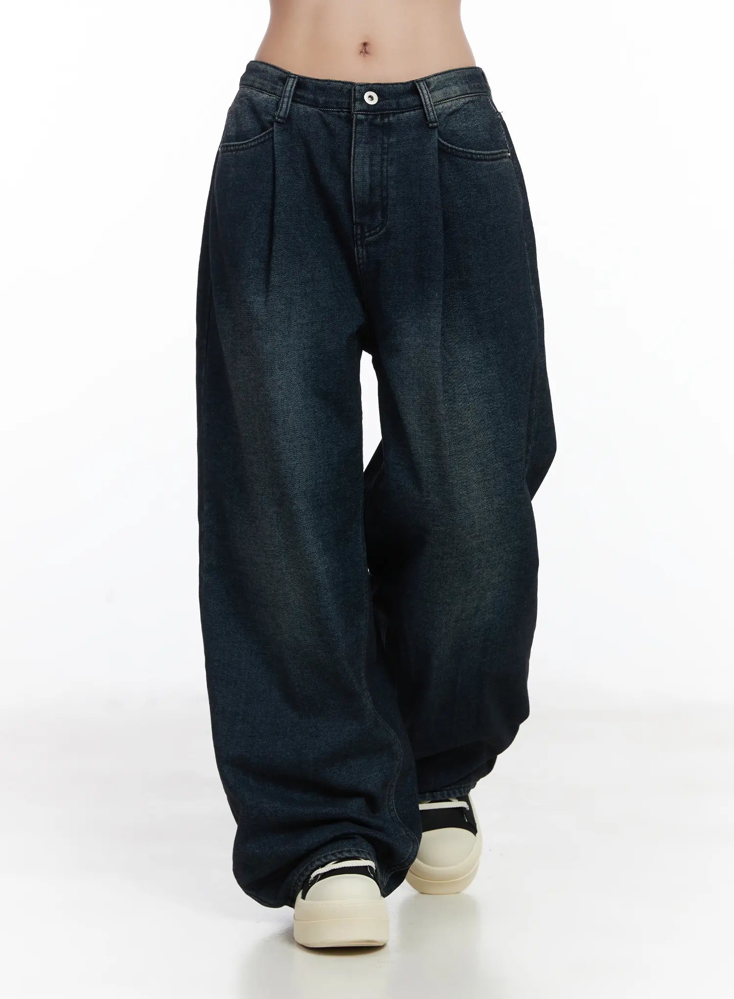 Lettie Fleece Pintuck Wide Leg Jeans CD529 in dark blue, front mid-shot from waist to ankle on model walking, pintuck pleat line and washed gradient fabric clearly visible.