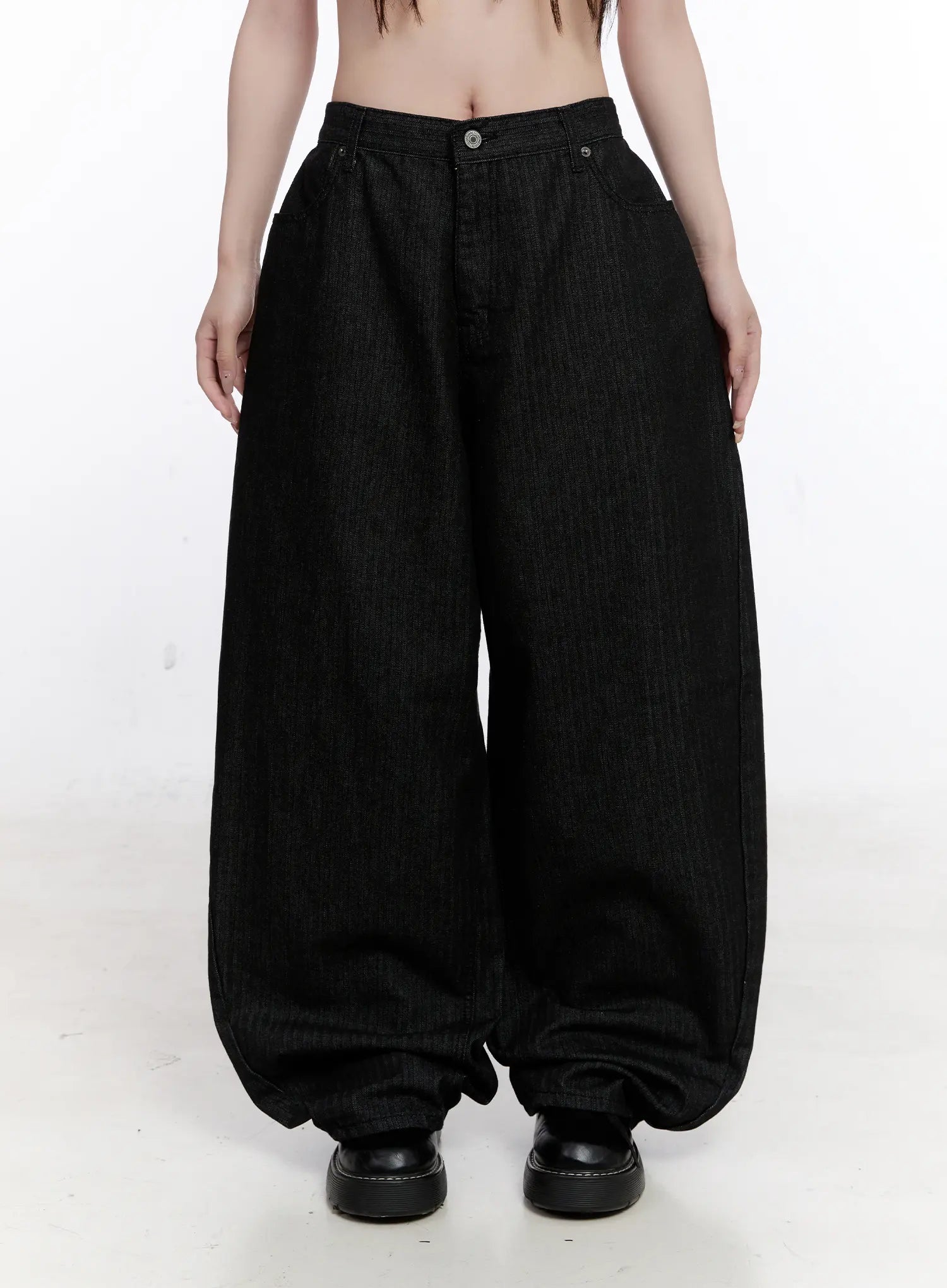 Vada Stitched Wide Leg Jeans CS530 in Black, front full-length product shot on model, oversized balloon wide-leg cotton denim with gathered hem pooling at ankles and button fly detail.