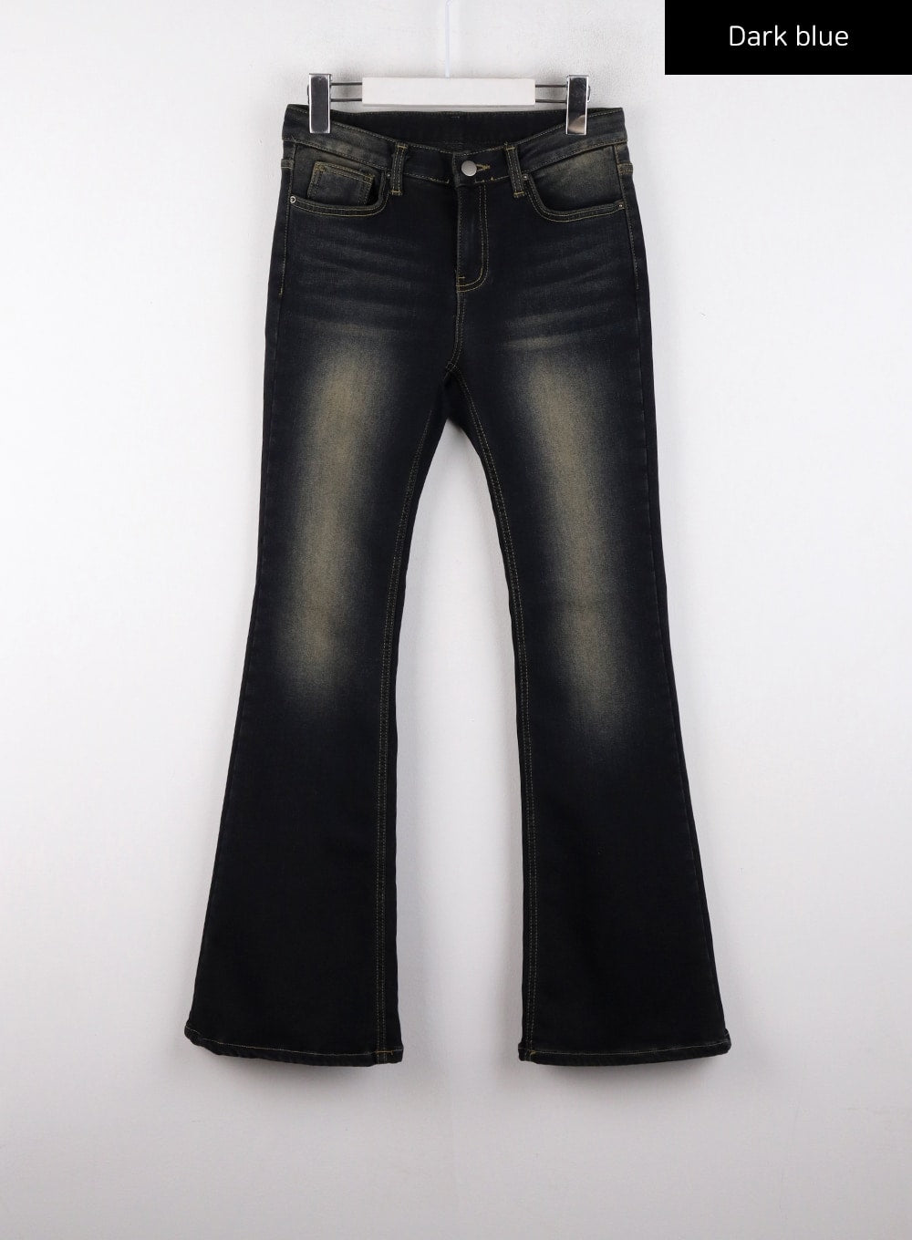 Washed Low Rise Bootcut Jeans CD308 in dark blue, flat front product shot on hanger, vintage washed denim with golden fading, low-rise waistband, five-pocket design and bootcut hem.