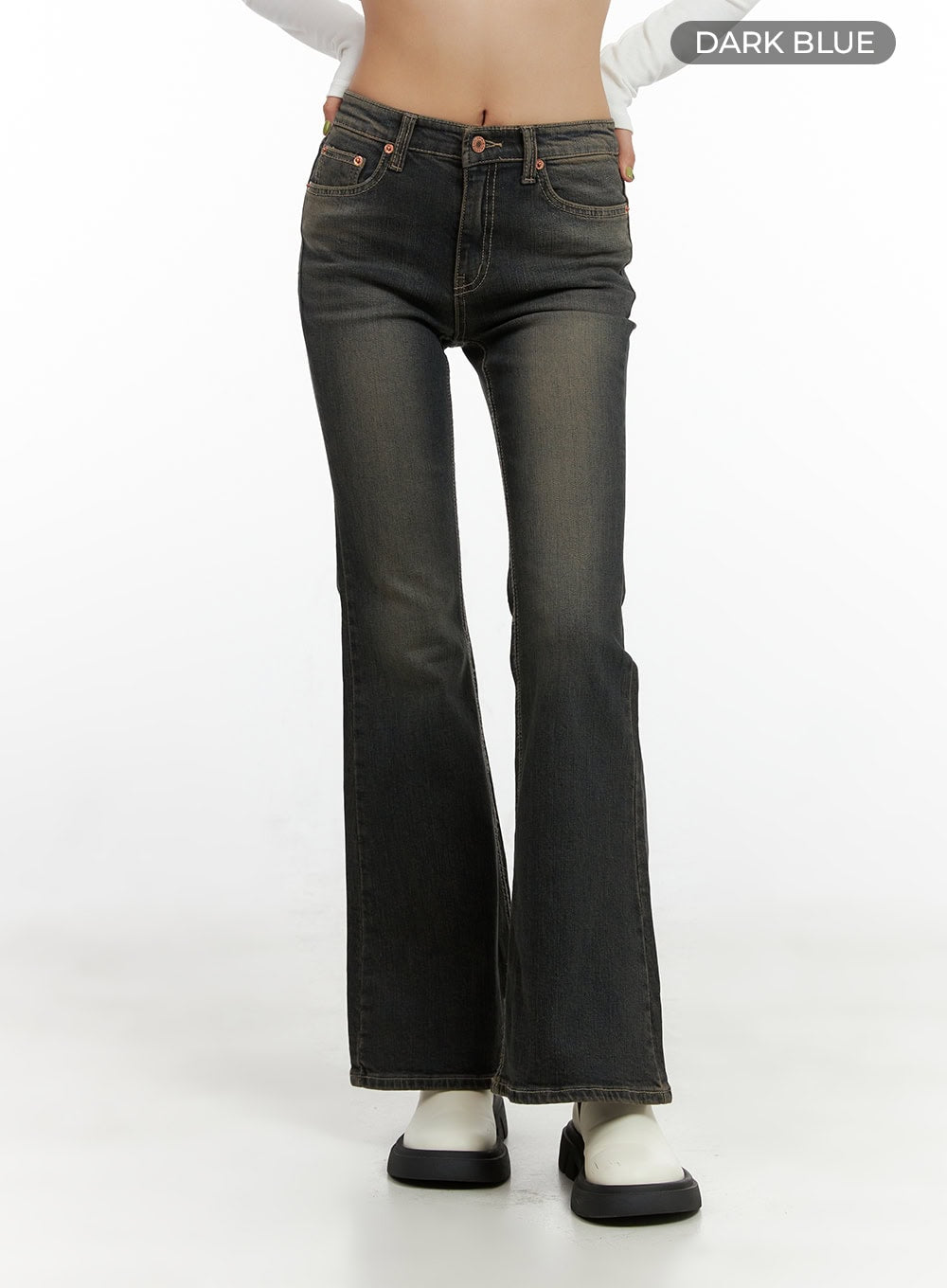 Paisley Slim-Fit Bootcut Washed Jeans CO424 in dark blue colorway, front product-focused shot from waist to hem on model, low-rise fit, five-pocket styling with rose-gold rivets, bootcut flare.