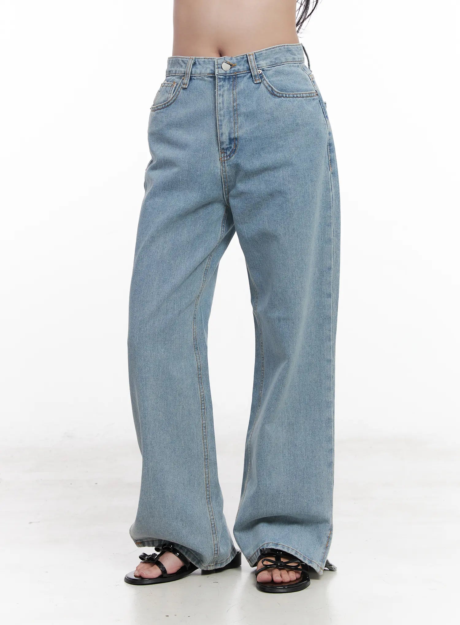Hyuna Slit Straight-Fit Jeans CU525 in light blue, front three-quarter view from waist to hem on model, washed wide-fit denim with 5-pocket construction and front-seam slit detail.