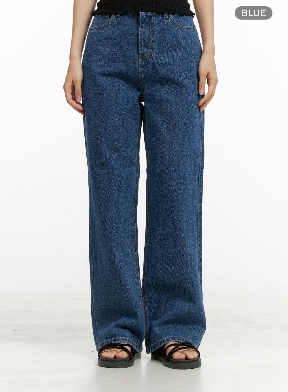 Blue Wide-Leg Jeans OU407 in blue, front waist-to-hem product detail shot on model, color-label view highlighting washed cotton denim texture, high waist, belt loops, and wide straight leg.