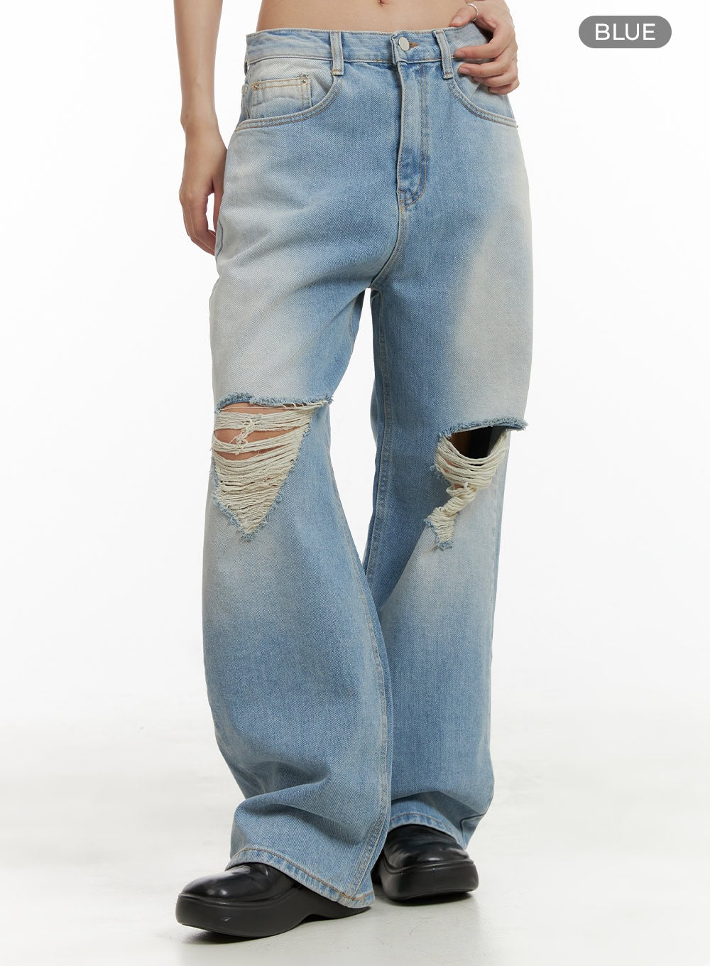 Urban Washed Ripped Baggy Jeans CU405 in Blue, angled front waist-to-hem on model, color label visible, wide-fit washed denim with dual large destroyed knee holes and frayed detailing.
