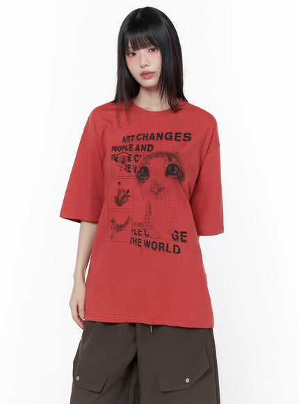 Oversized Cat Print Graphic Tee CU519 in dark red, front waist-up shot on model, full graphic print detail with cat face and slogan, crew neck and drop-shoulder half-sleeve silhouette shown clearly.