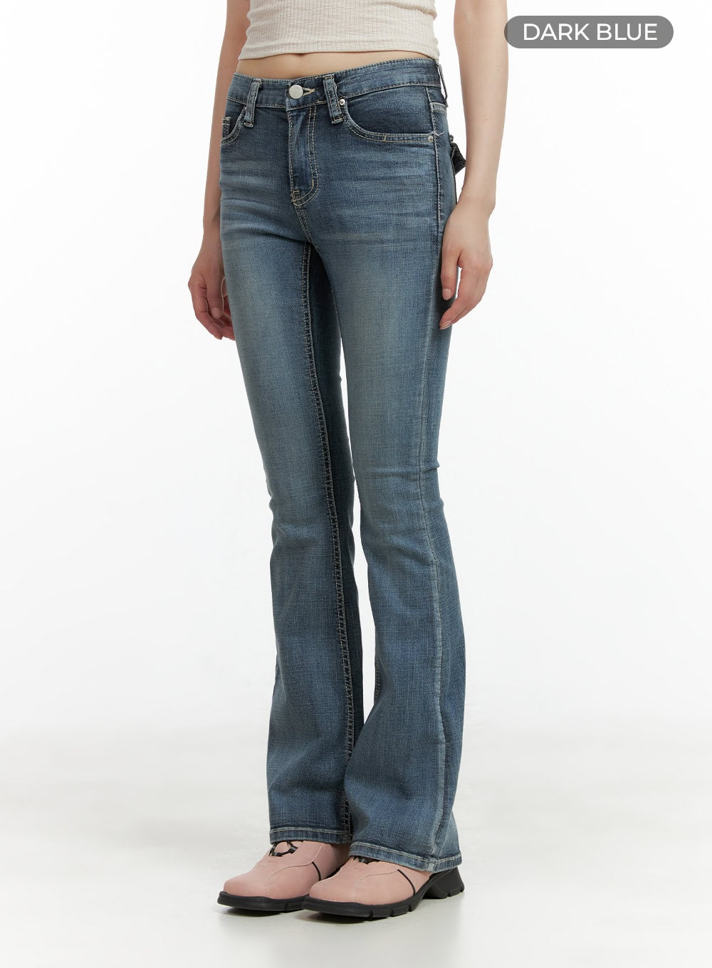 Tight Fit Low Waist Bootcut Jeans CL403 in dark blue, front angled product shot on model, color swatch label shown, low waist fit with washed bootcut denim, paired with pink boots.
