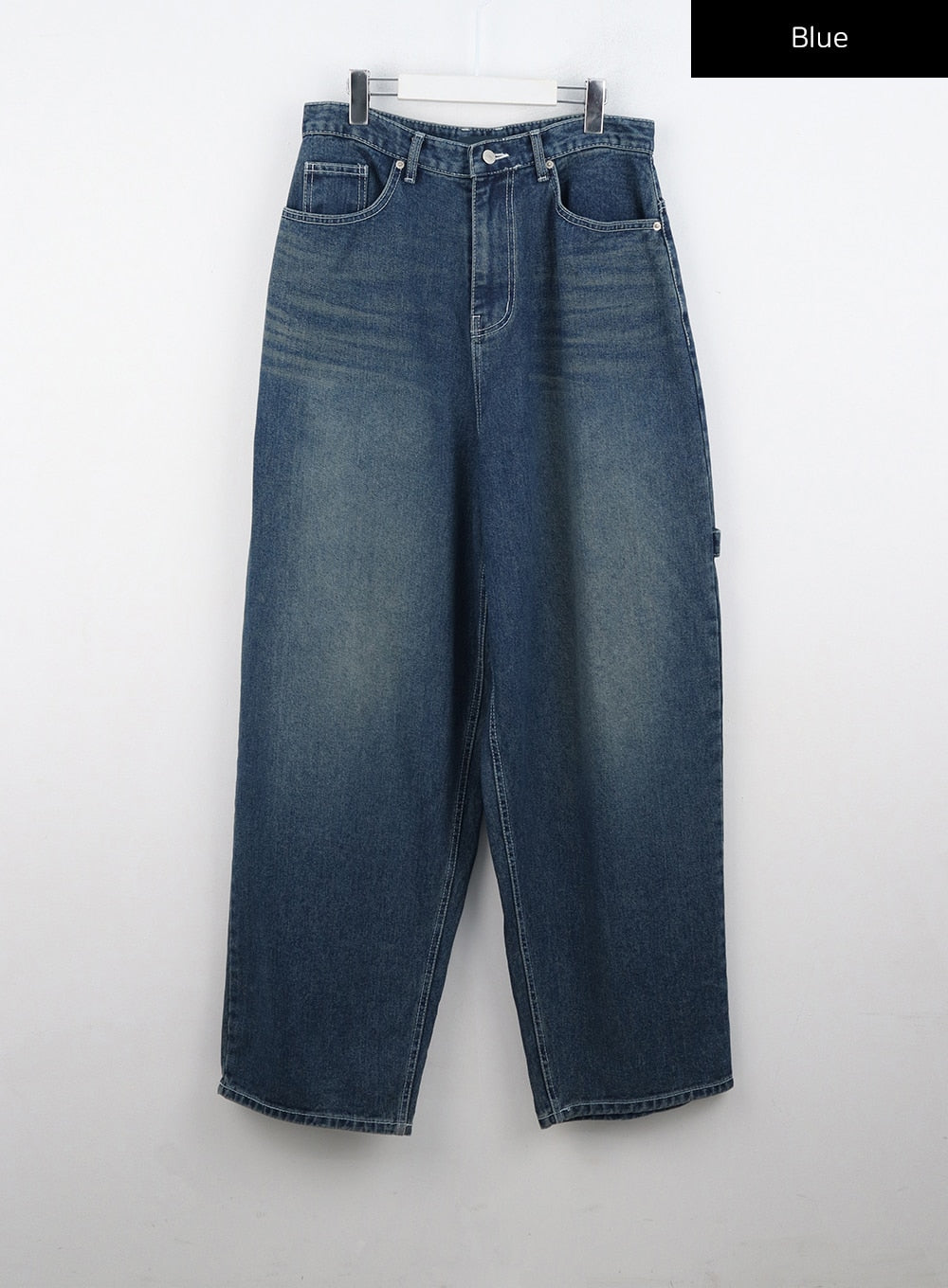 Washed Cotton Wide Leg Jeans CO323 in blue, flat product-only shot on hanger, high-rise washed cotton denim, balloon wide leg silhouette with five-pocket construction and contrast stitching.