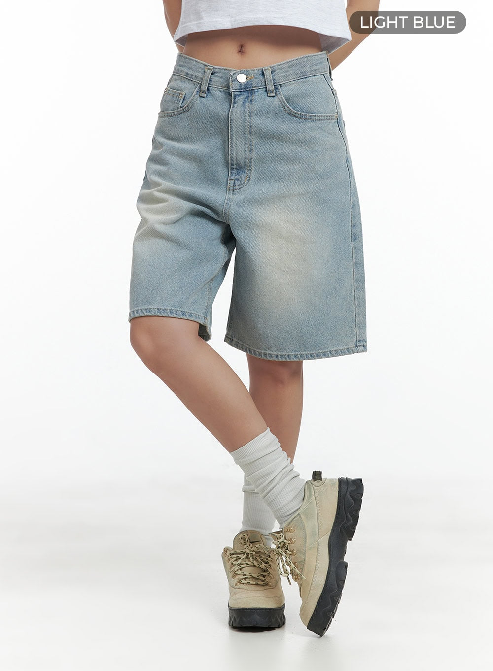 Light Washed Jorts CL417 in light blue, front angled close-up on model, wide-fit washed denim shorts with five-pocket construction, high waist, and clean hem, color label visible.