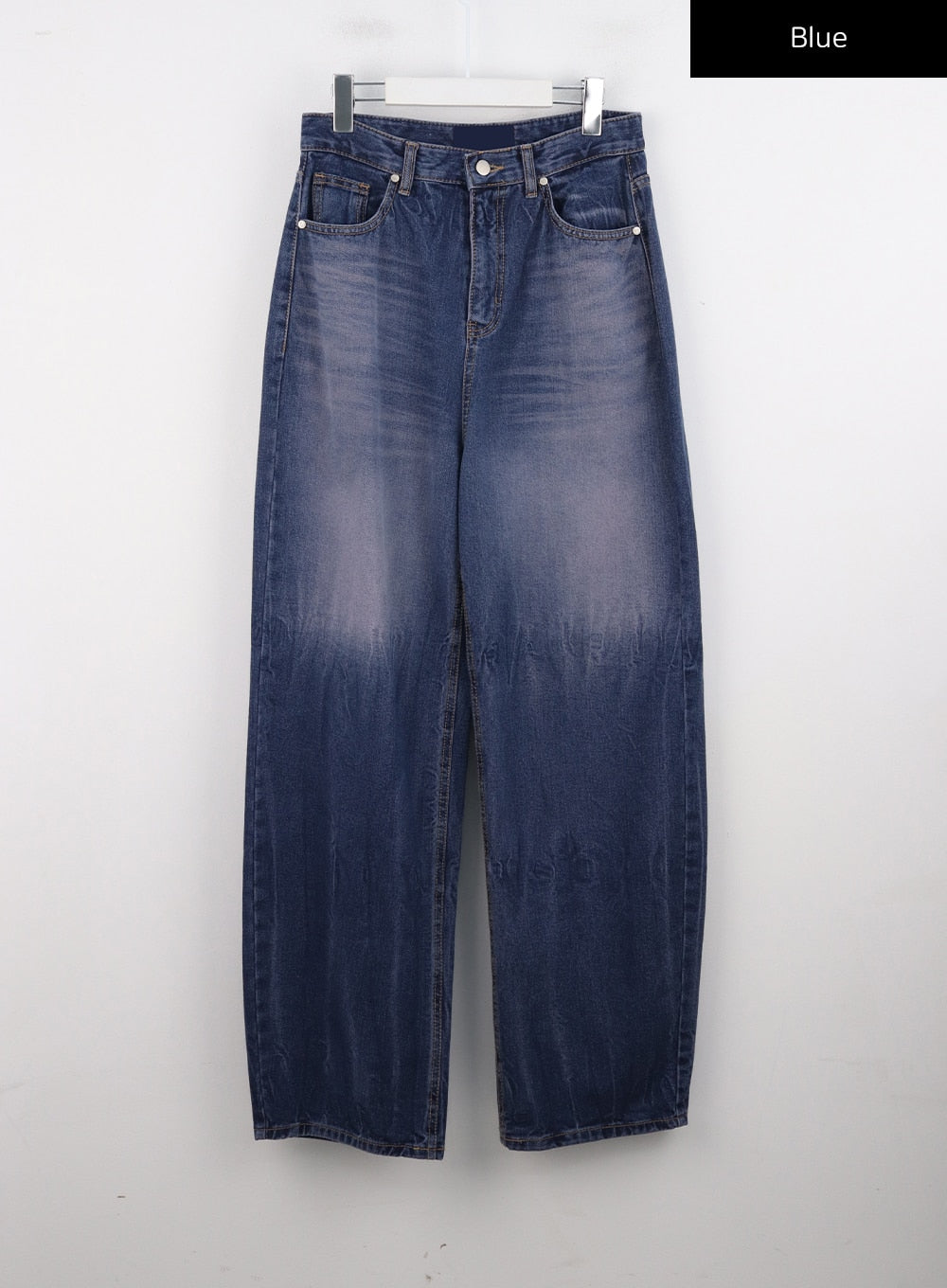 Wide Leg Cotton Jeans CG331 in blue, flat product shot on hanger, front view showing washed indigo denim, high-rise waist, five-pocket detail, and wide barrel leg silhouette.