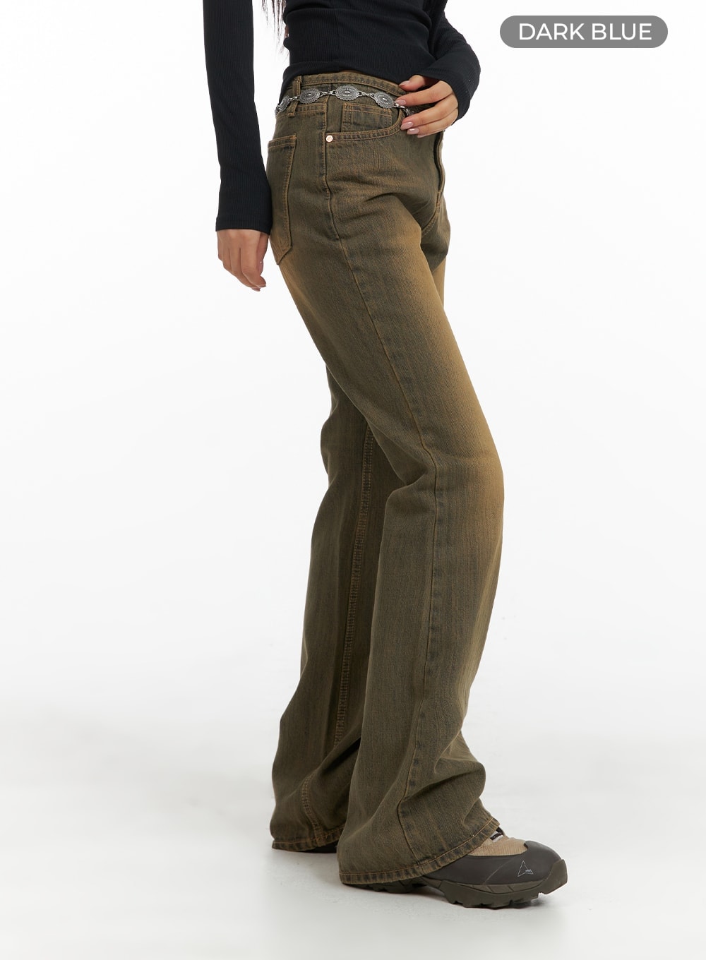 Vintage Washed Flared Jeans CM411 in dark blue, side profile on model, full-length view showing slim fit through thigh and flared hem, vintage brown washed cotton denim with chain belt.