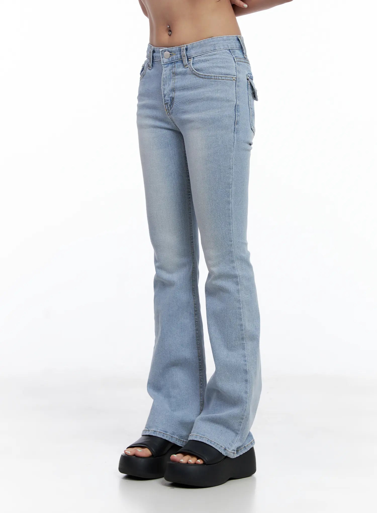 Yeojin Classic Flare Denim Jeans CL510 in light blue, side close-up on model from hip to hem, showing washed gradient, front pocket stitching, and subtle bootcut flare.