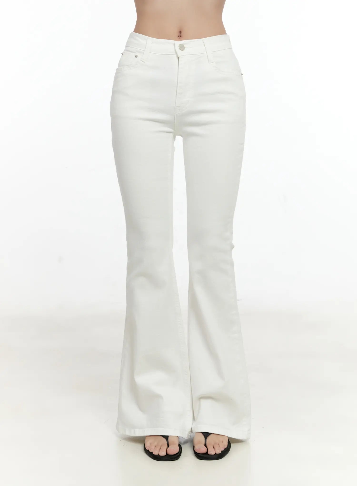 High-Waist Flare Pants CG501 in white, front product-style shot on model, high-waist waistband with button closure, slim fit through thigh, flared leg.