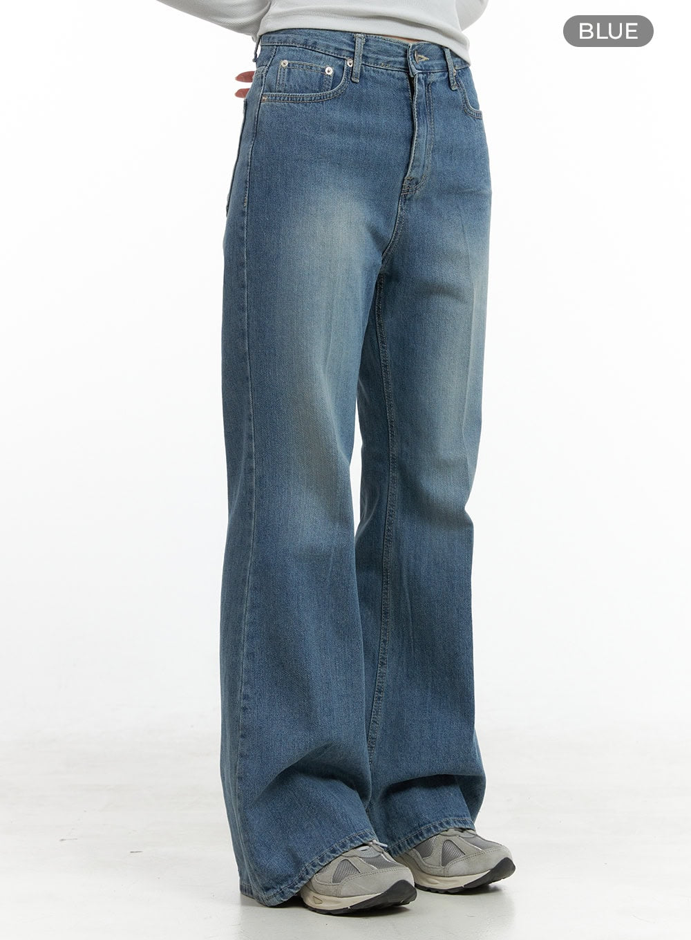 Daisy Loose Fit Bootcut Jeans CG419 in blue, side-angle product shot on model with BLUE color label, washed denim showing front seam, waistband hardware and flared leg.