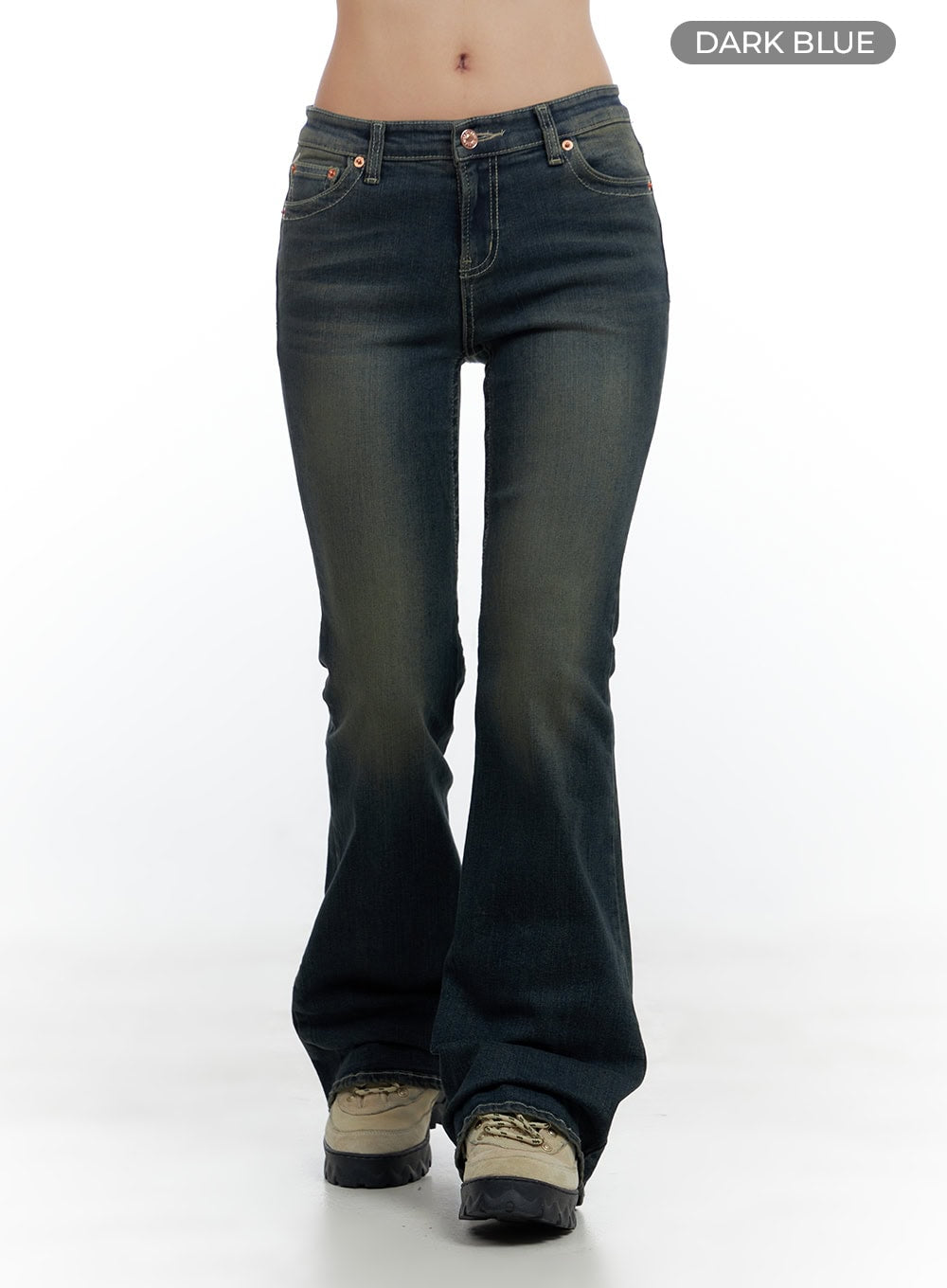 Aspen SlimFit Washed Bootcut Denim Jeans CS424 in dark blue, front color-swatch shot on model, low-rise five-pocket styling, vintage washed finish with copper buttons, tall bootcut hem over chunky sneakers.