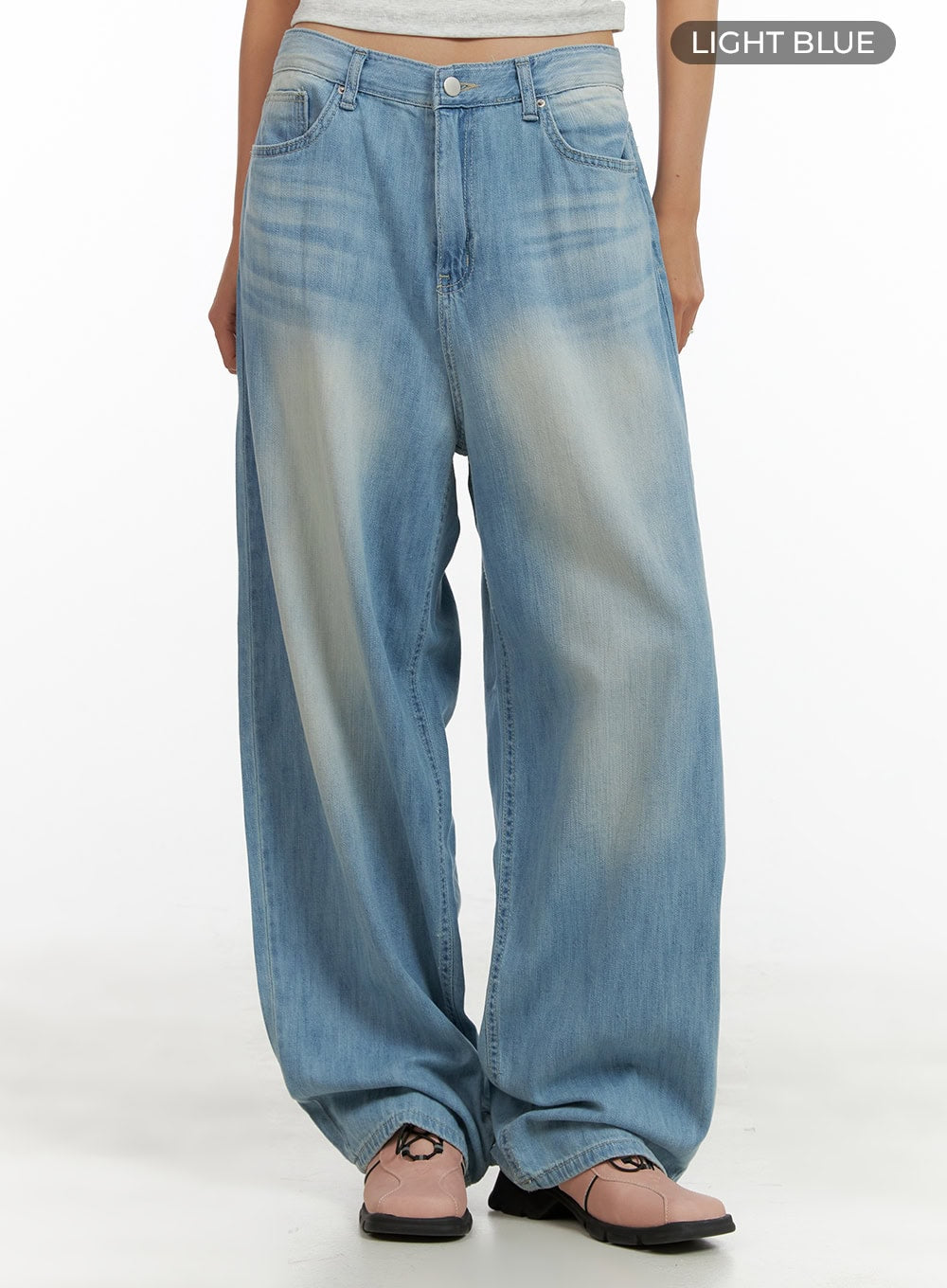 Washed Comfort Baggy Jeans CU414 in light blue, front product-focused shot from waist to hem on model, color swatch label visible, wide-fit washed denim with balloon-style leg.