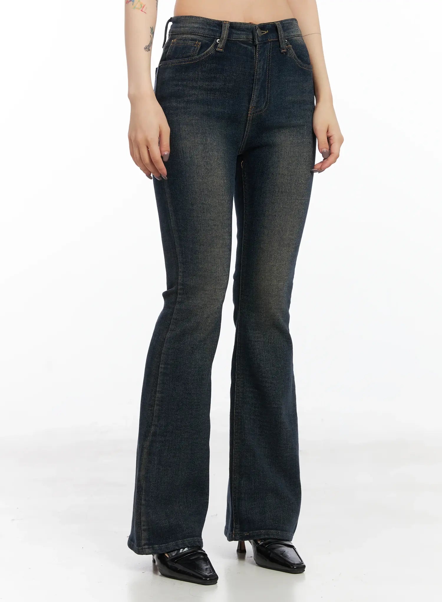Jordyn High-Waist Bootcut Jeans CD502 in dark washed indigo, front mid-length view on model, high-waist with subtle vintage wash fading, five-pocket layout, slim fit through thigh with gentle bootcut flare.